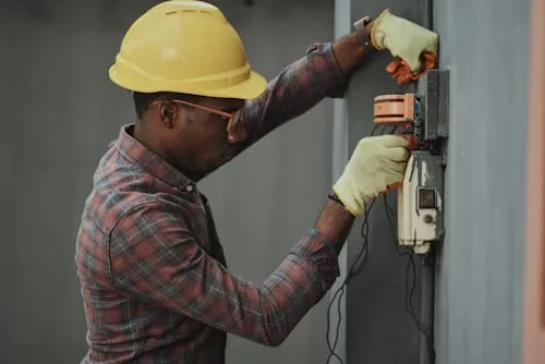 Professional technician performing HVAC maintenance in Belton, TX